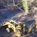 Can a backhoe clearing land?
