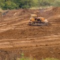 What is land clearing in construction?