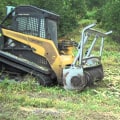 What is the best equipment to clear land?