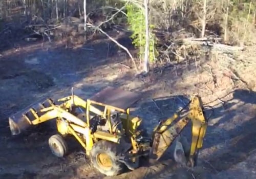 Can a backhoe clearing land?